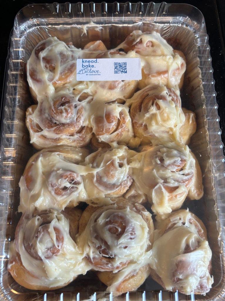 homemade cinnamon buns with cream cheese frosting made with challah dough